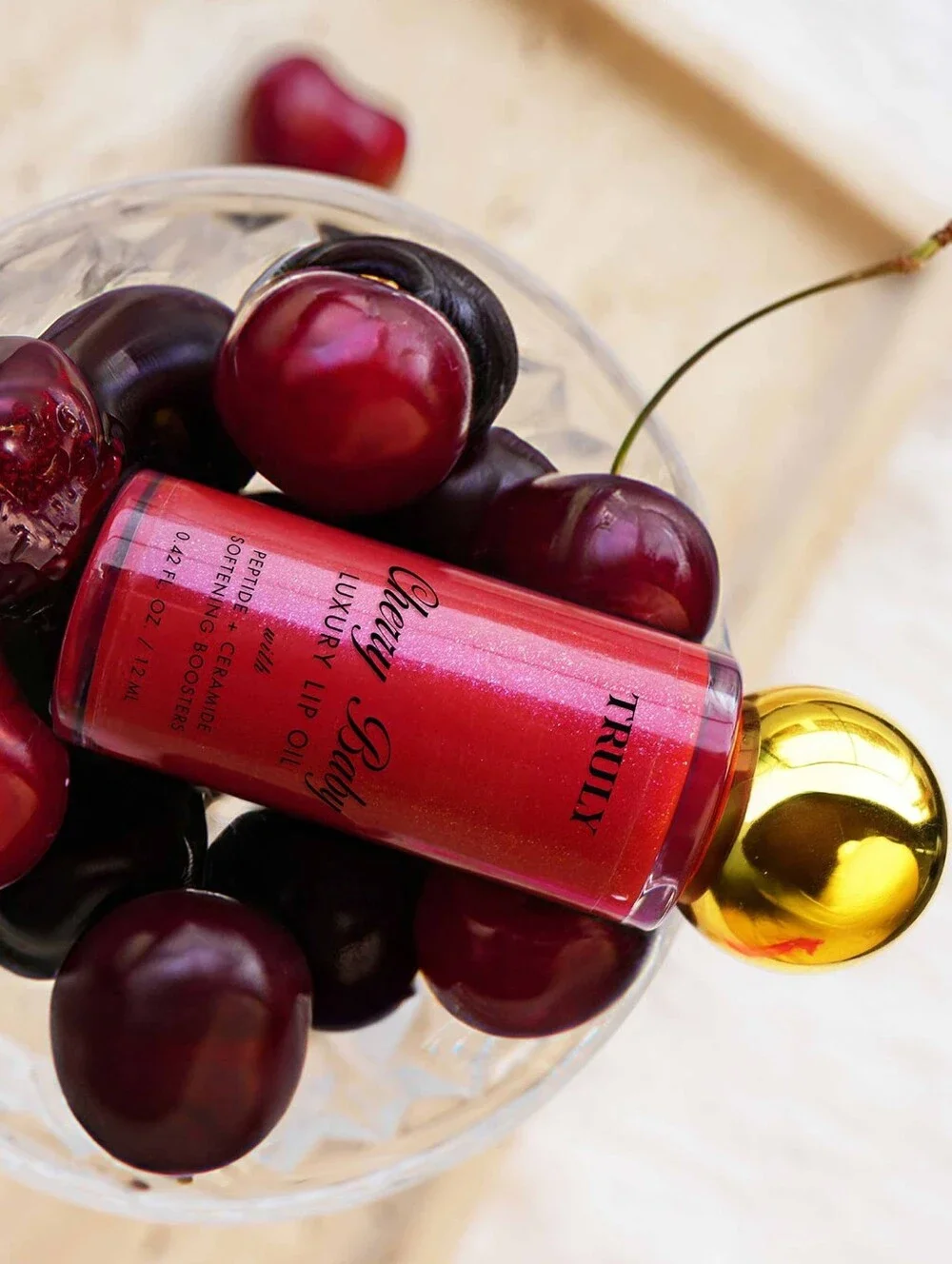 TRULY BEAUTY Cherry Baby Luxury Lip Oil - Shimmery Cherry Red